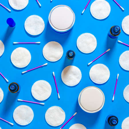 Cosmetic content. Top view. Flat lay composition with cosmetic products on color backgroundの写真素材