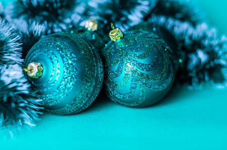 Christmas composition with blue decorations, confetti on blue background with copy space. Top view, Flat layの写真素材