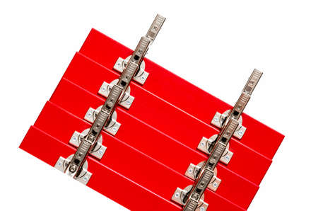 The red facades for the chest of drawers with metal loops lie on a white background. Assembly and installation of furniture. Businessの写真素材