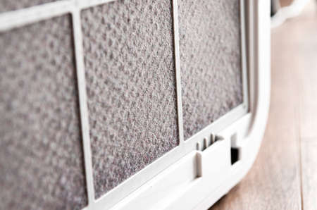 HEPA filter for air purification in the apartment and office is covered with a layer of dust. Purity. ecology. Clean airの写真素材