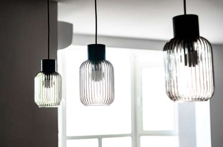 Glass ceiling lamps in white interior. House. Designの写真素材