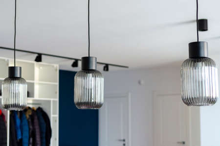 Glass ceiling lamps in white interior. House. Designの写真素材