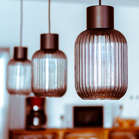 Interior design. Textured glass ceiling lamps in the Scandinavian interior. Houseの写真素材