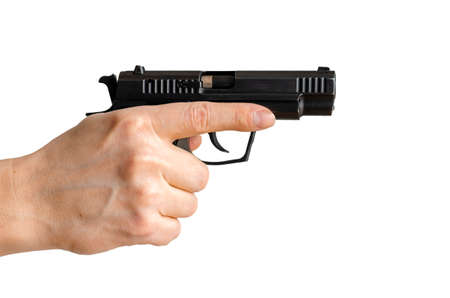 Pistol, or Auto-Loader Short gun in female's hand preparing or self loading prompt to use. Man holding gun aiming pistol in hand ready to shoot. The criminal robber or gangster thief conceptの写真素材