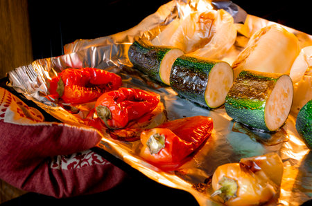 healthy eating. Vegetables baked in the oven. Pepper and zucchini with a ruddy crust are prepared in the oven.の写真素材