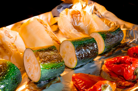 healthy eating. Vegetables baked in the oven. Pepper and zucchini with a ruddy crust are prepared in the oven.の写真素材