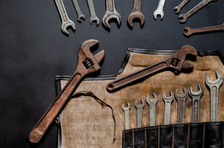 Hand tools for repair and reconstruction in home conditions lie on a black background. copy spaceの写真素材