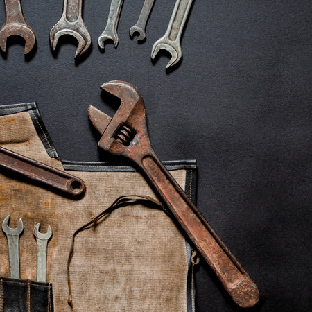 Hand tools for repair and reconstruction in home conditions lie on a black background. copy spaceの写真素材