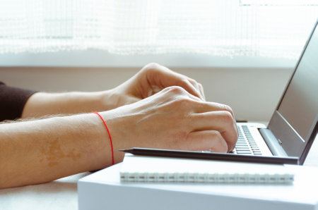 Business work on laptop. freelancer. Remote work in the home officeの写真素材