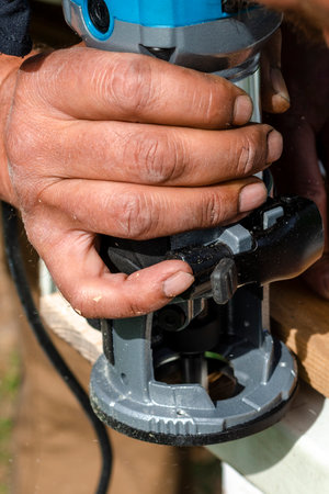 Woodworking shank router bit. Shaping copying shank router bit clamped in chuck of a working machine tool.の写真素材