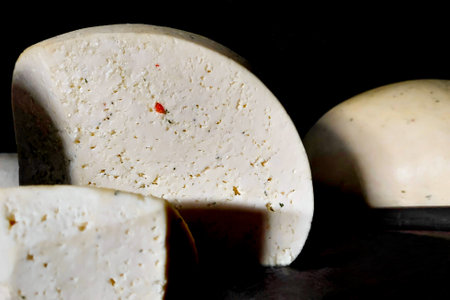 Homemade cheese with chilli from cow's milk, which grazes high in the mountains, made by shepherdsの写真素材