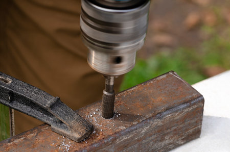 technician working on a lathe and tools to work. Technicians, workers, engineers working with metal lathesの写真素材