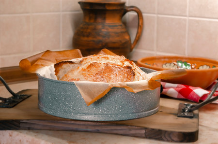 Homemade handmade craft bread on a wooden boardの写真素材