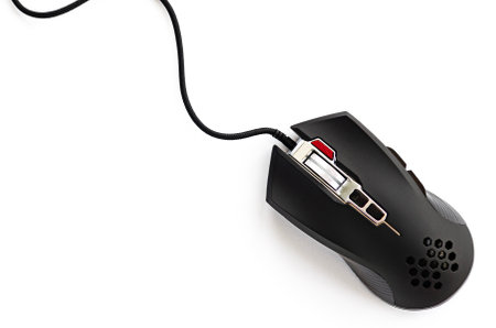 Black computer mouse close-up on a white background. Professional gaming wired mouse isolated on a white backgroundの写真素材
