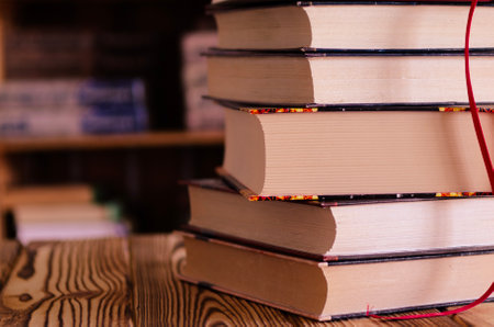 Books. Old books against the background of bookshelves.の写真素材