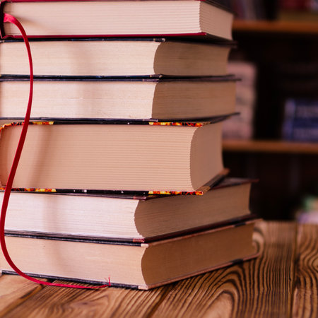 Books. Old books against the background of bookshelves.の写真素材
