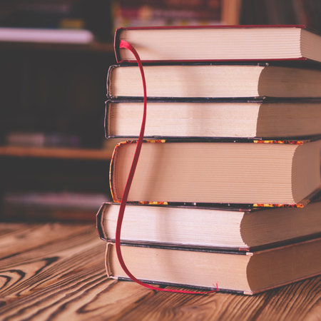 Books. Old books against the background of bookshelves.の写真素材