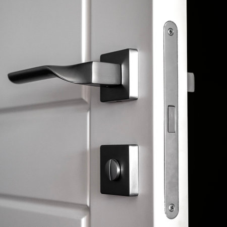 Mortise lock. White wooden door with magnetic lock.の写真素材