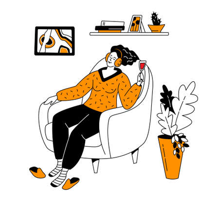 Dreaming woman with a glass of red wine sits in an armchair and listens to music on headphones.のイラスト素材