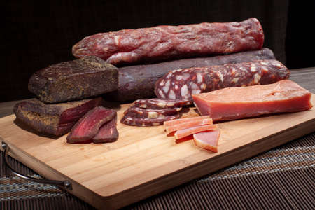 sausages meat products on the boardの写真素材