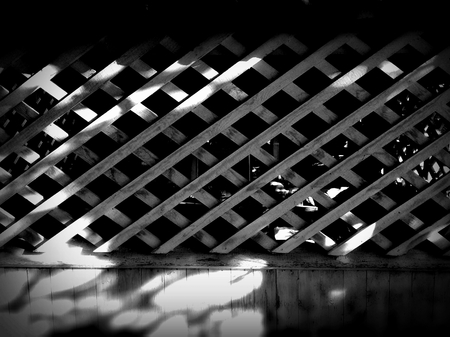 Wooden lattice in the attic in black colorの写真素材