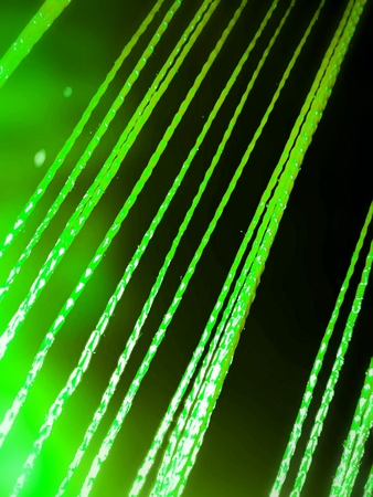 Texture of green threads on a black backgroundの写真素材
