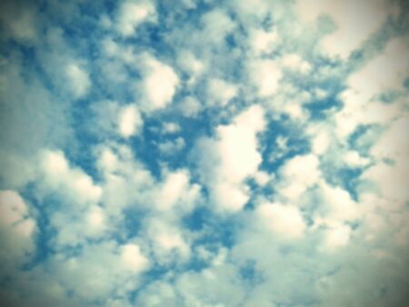 Blurred background from clouds on blue skyの写真素材