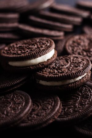 Chocolate sandwich cookies with cream filling