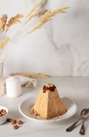 Cheese paskha with nuts and chocolate. Traditional Russian or Ukrainian Easter dish.の写真素材