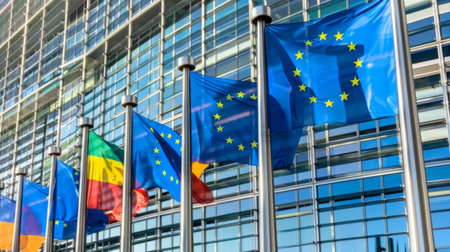 European Union flags in front of the European Parliament.の素材