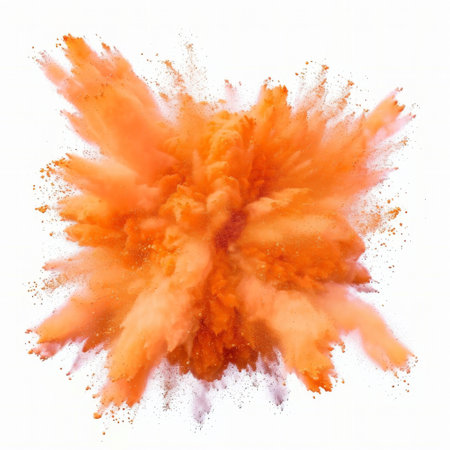orange powder explosion on white background.の素材