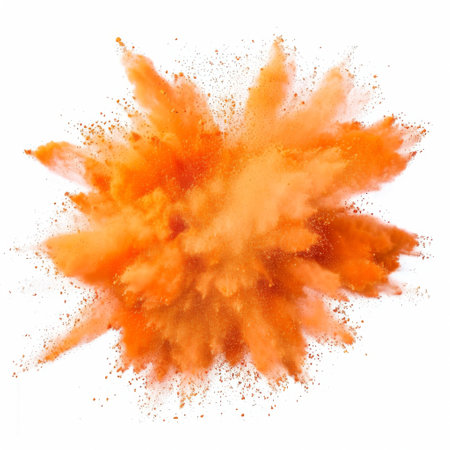 orange powder explosion on white background.の素材