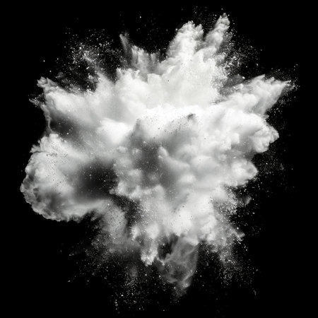 White powder explosion on a black background.の素材