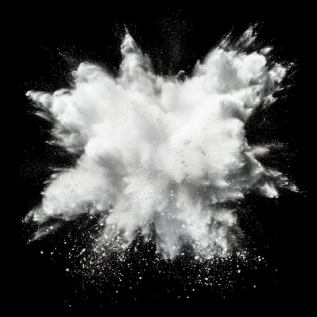 White powder explosion on a black background.の素材
