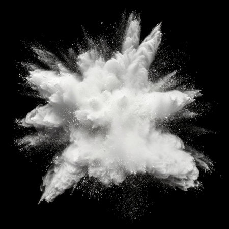 White powder explosion on a black background.の素材
