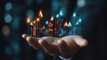 Hand holding growth business strategy arrow, concept on success target improvement with increase development graph.の素材