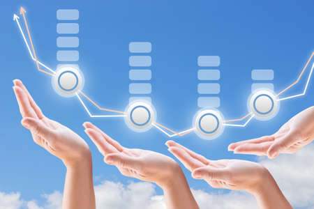 hands support the growth and promotion seo on the background of sky and cloudsの写真素材