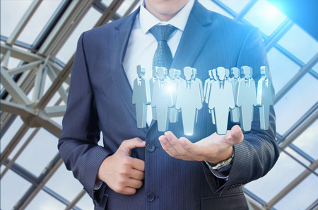 Target Customers in the hand of a business man.の写真素材