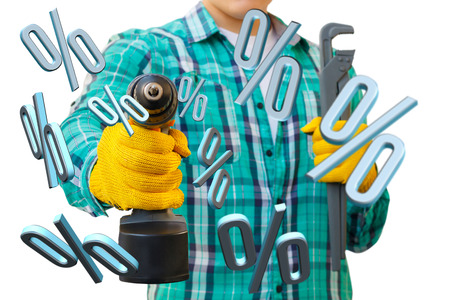 Repairman with the screwdriver and the wrench in the background of interest.の写真素材