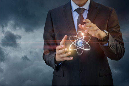 Atom shows the businessman . A concept design.の写真素材