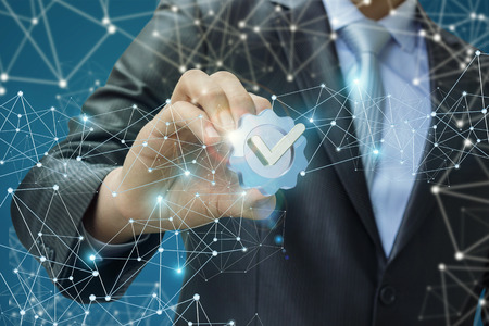 Businessman shows sign top service in the background network.の写真素材