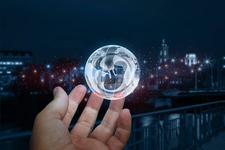 Hand showing earth with a human embryo on blurred background. The concept of inception.