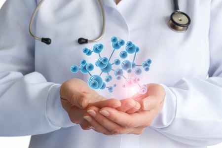 Doctor shows DNA molecule . The concept of testing.の写真素材