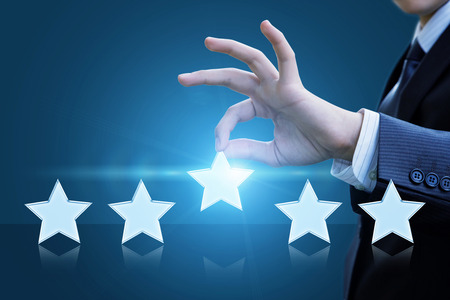 A businessman evaluates the service and gives it five stars.