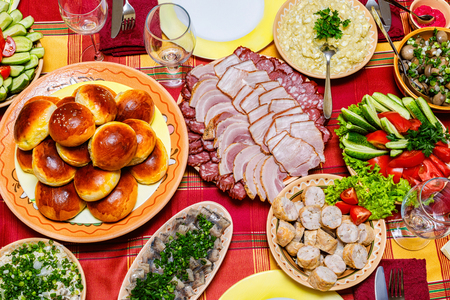 Cuts of meat and sausages on the holiday table .の写真素材