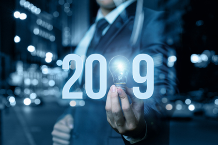 2019 Ideas concepts with business man hand holding light bulb.の写真素材