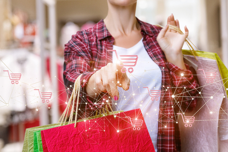 Shopper clicks on the icon buy . Concept shopping.の写真素材