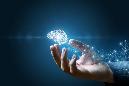 Brain of the gears shows a hand on a blue background.