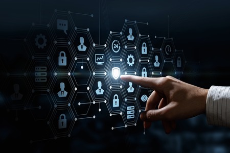 A male hand is operating with the financial and data security system structure consisting of symbols...