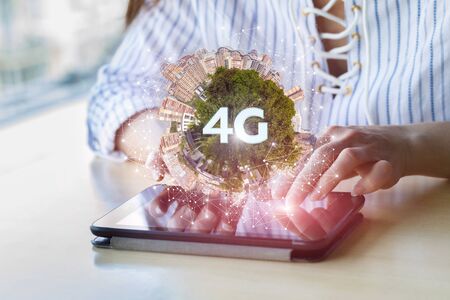 4G network connection concept . A woman working in the tablet .